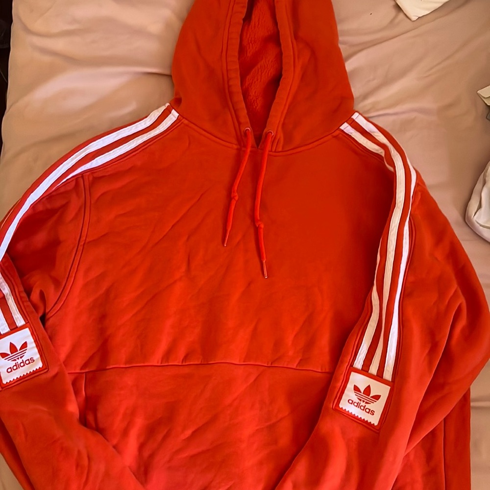Bright Orange adidas pullover hoodie.